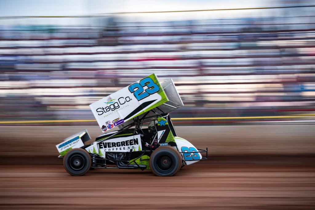 American Sprint Car Series driver Seth Bergman racing around a race track.